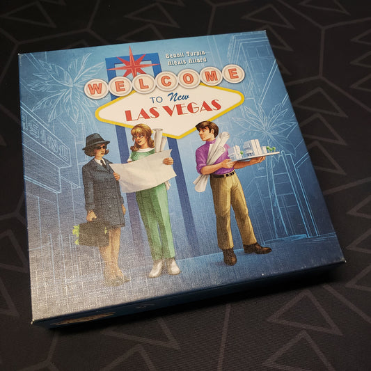 Image shows the front cover of the box of the Welcome to New Las Vegas board game