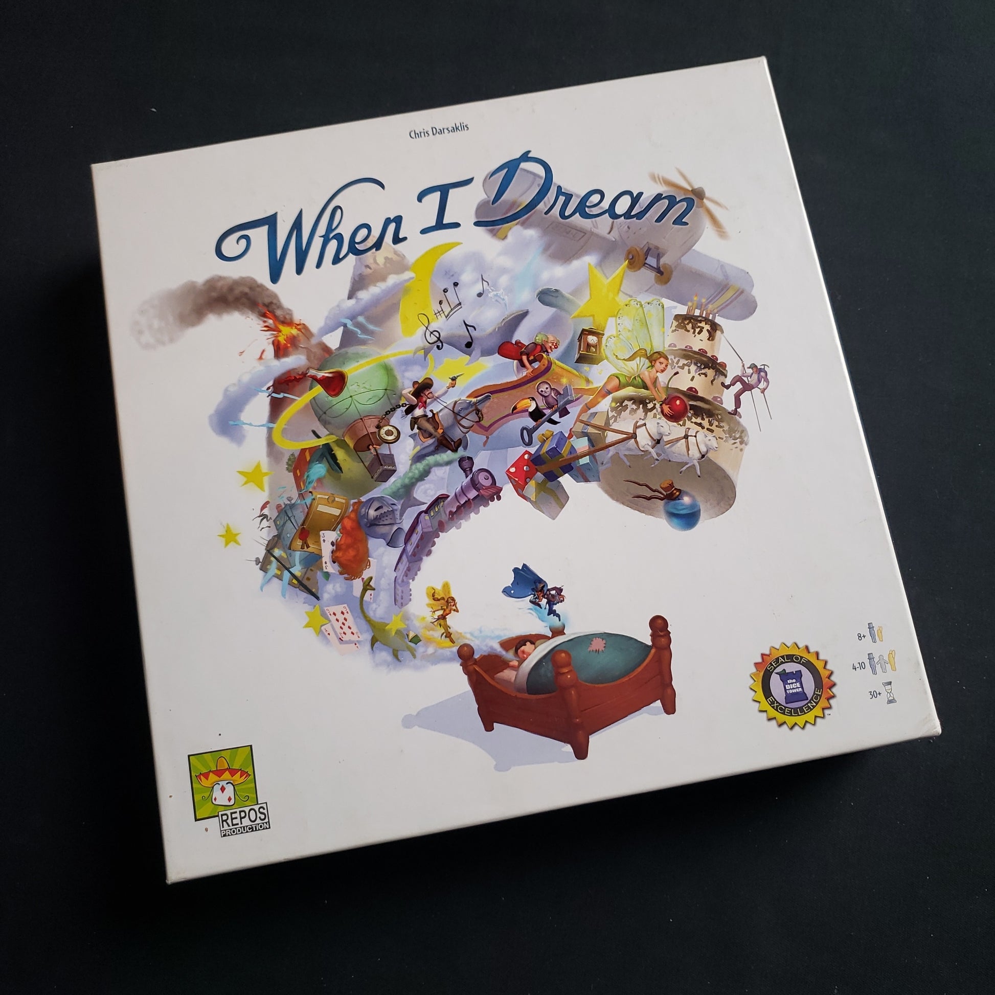 Image shows the front cover of the box of the When I Dream board game