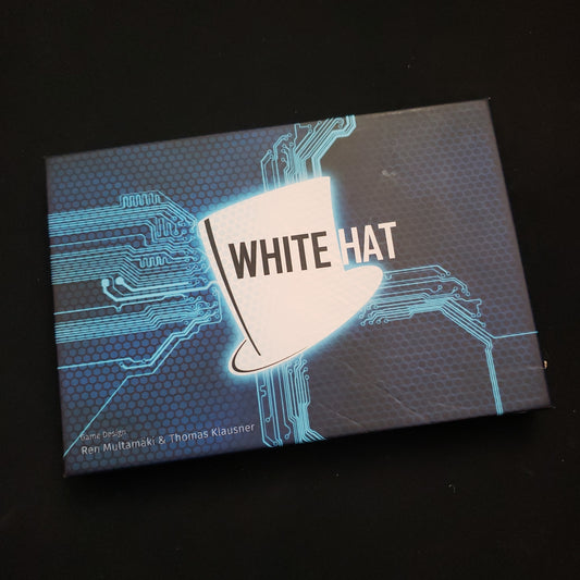 Image shows the front cover of the box of the White Hat card game