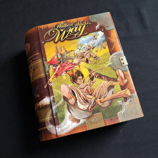 Image shows the front cover of the box of the Wicked Witches Way board game