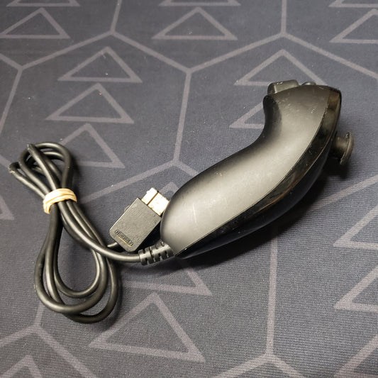 Image shows the side of a black Nunchuk controller for Nintendo Wii