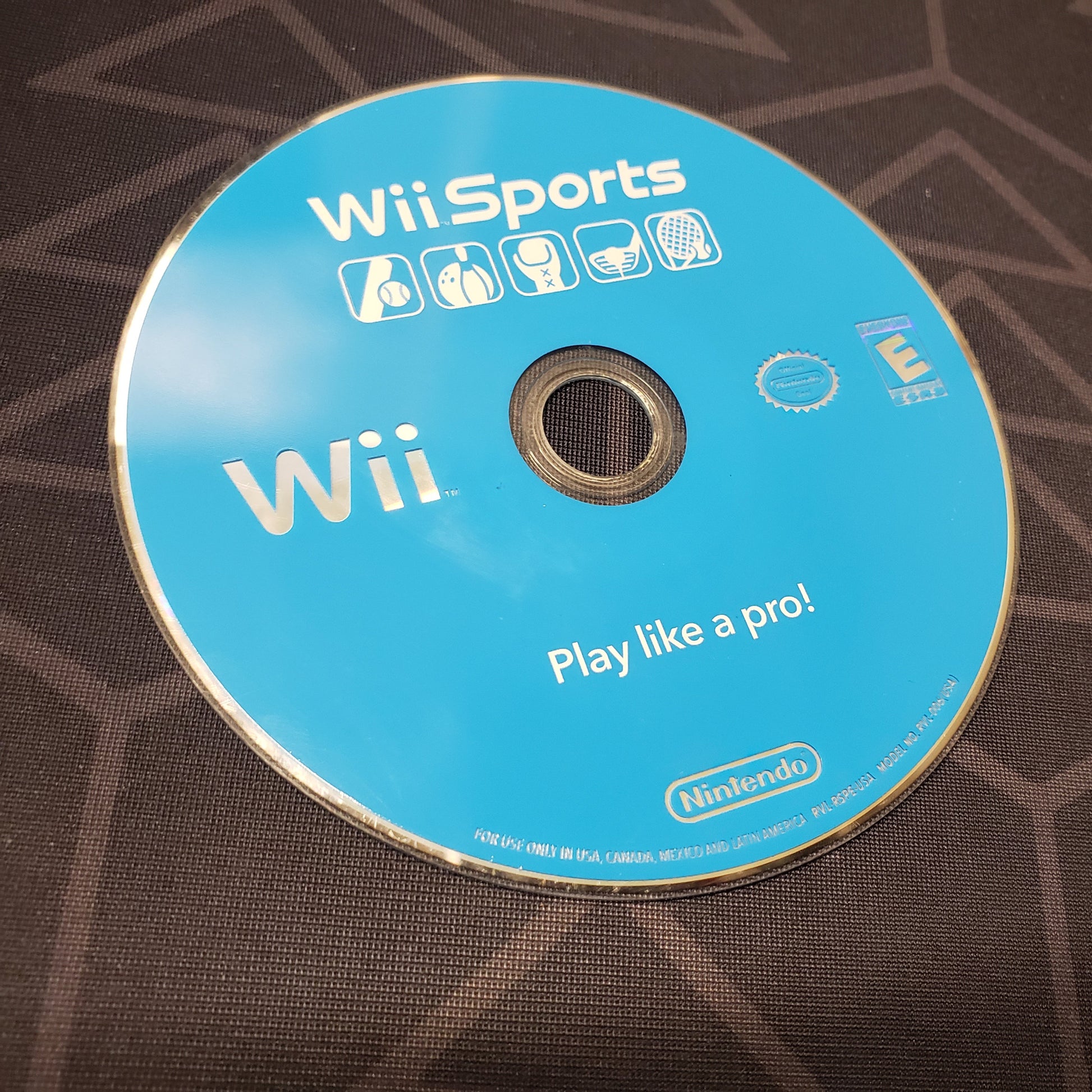 Image shows the label side of the game disc for the video game Wii Sports for Nintendo Wii