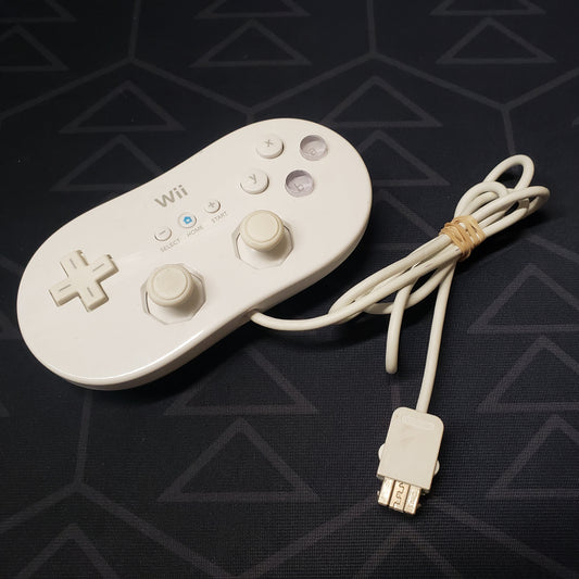 Image shows the top of a white Classic controller for Nintendo Wii