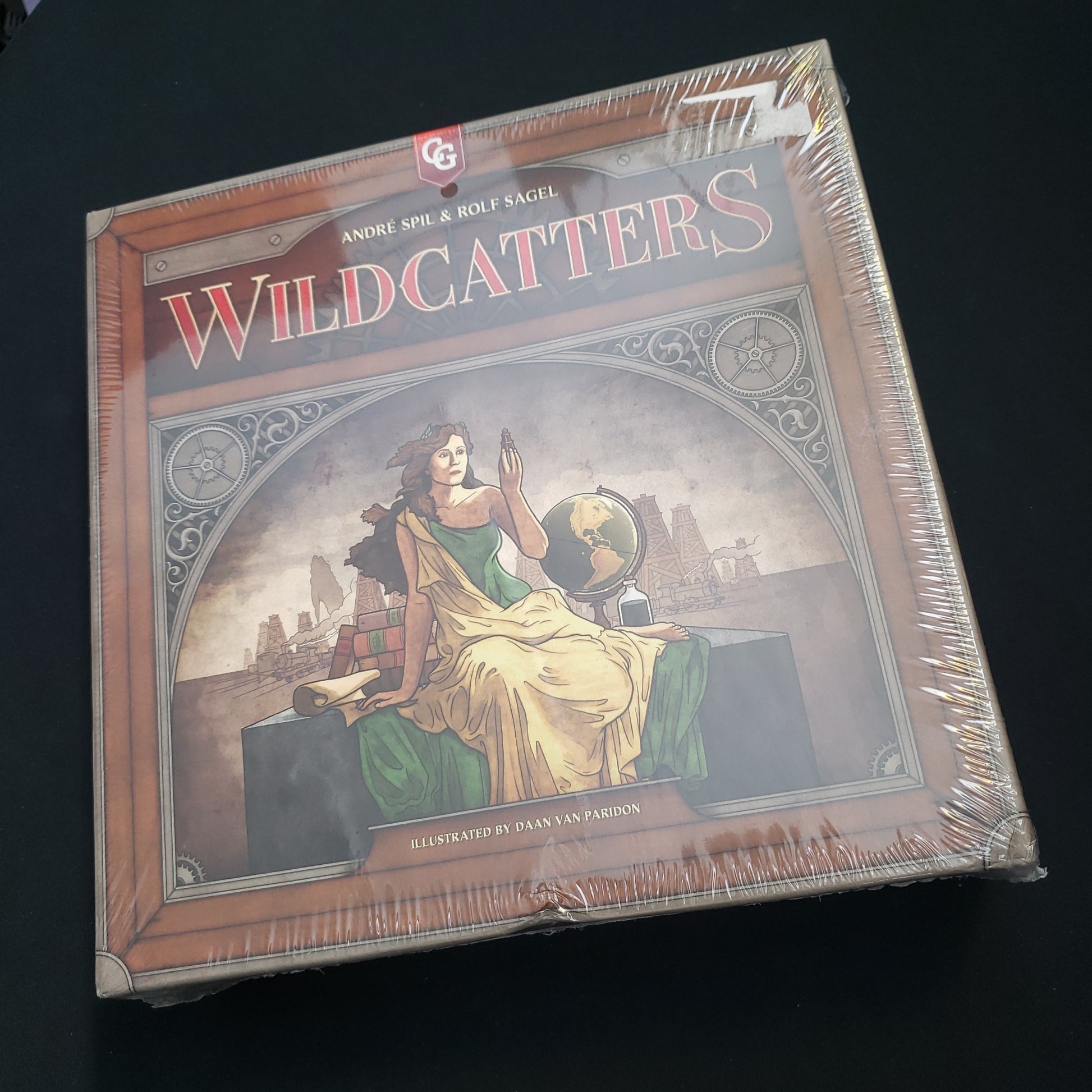 Image shows the front cover of the box of the Wildcatters board game