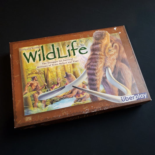 Image shows the front cover of the box of the Wildlife board game