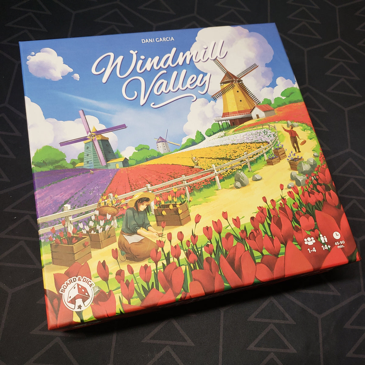 Image shows the front cover of the box for the Windmill Valley board game