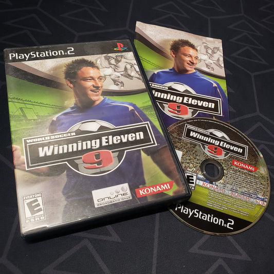 Image shows the case, manual and disc for the video game Winning Eleven 9 for Playstation 2
