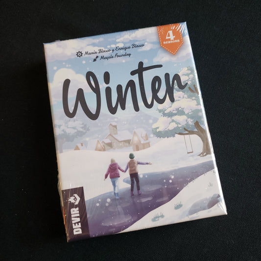 Image shows the front cover of the box of the Winter card game