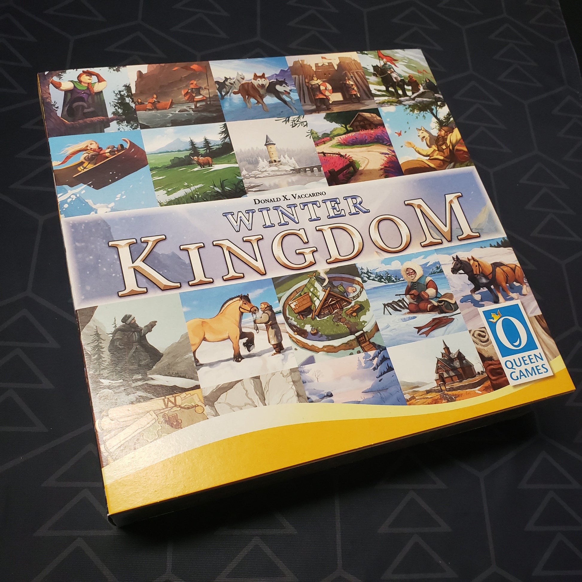 Image shows the front of the box sleeve for the Kickstarter Edition of the board game Winter Kingdom