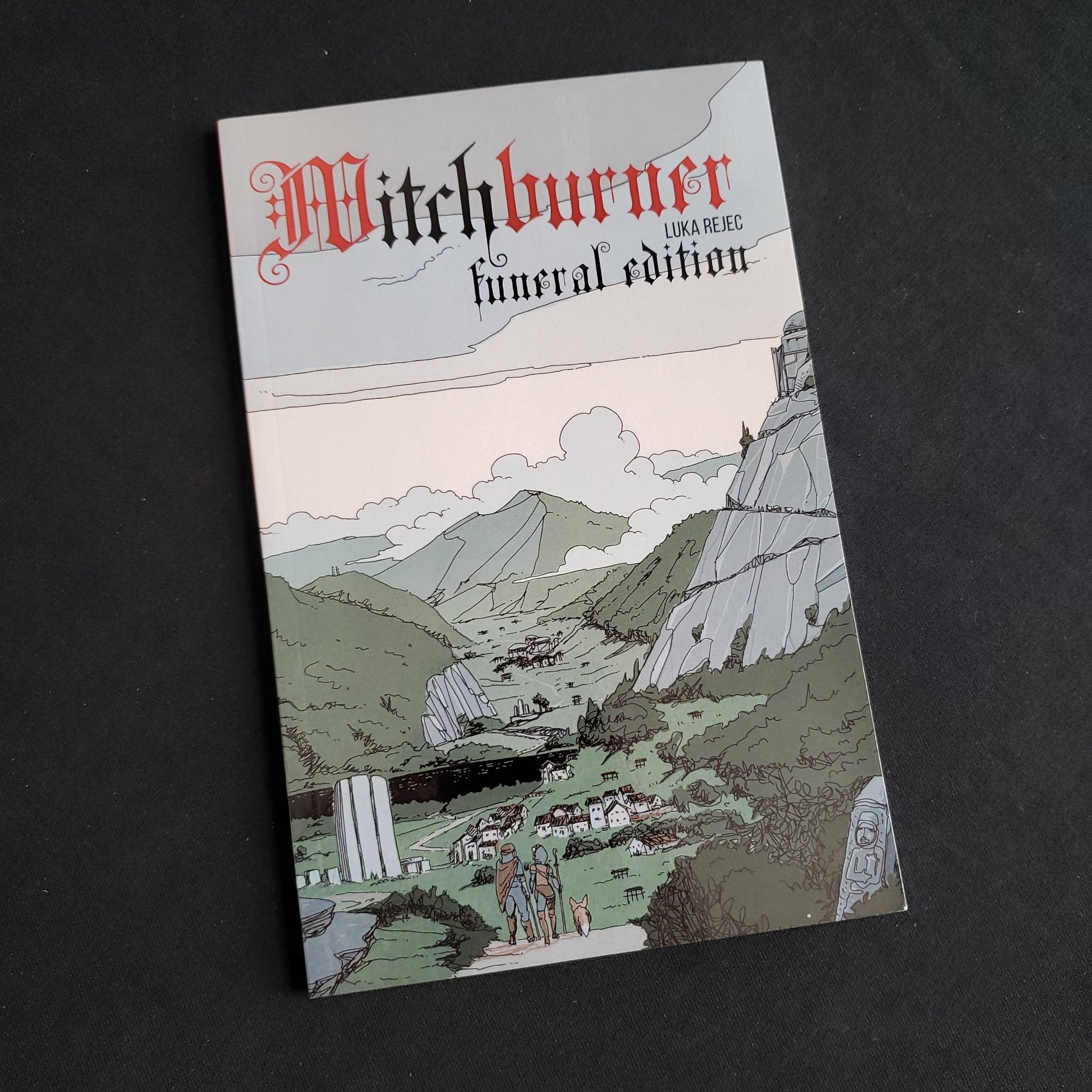 Image shows the front cover of the Witchburner: Funeral Edition roleplaying game book