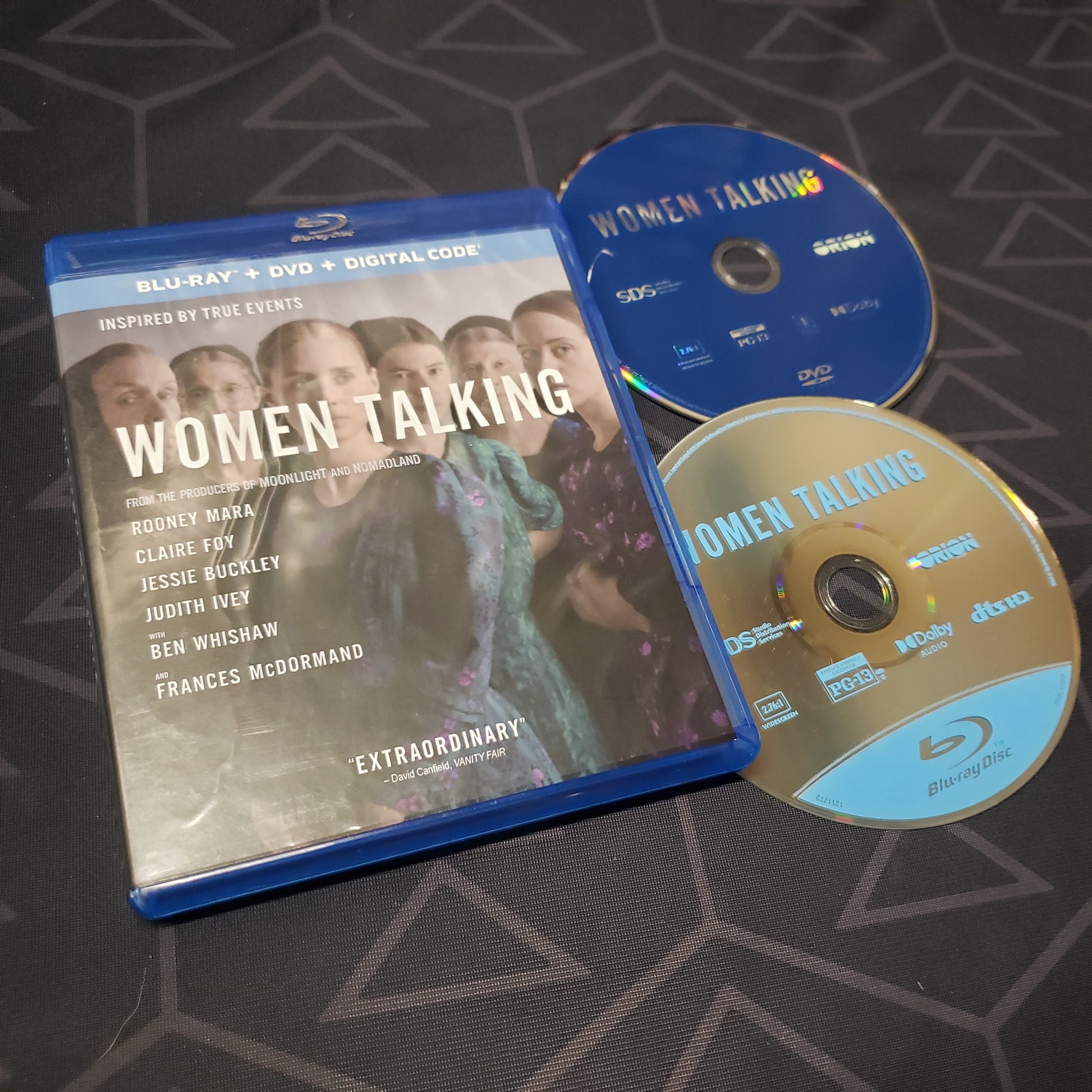 Image shows the case & two discs for the movie Women Talking on Blu-Ray & DVD
