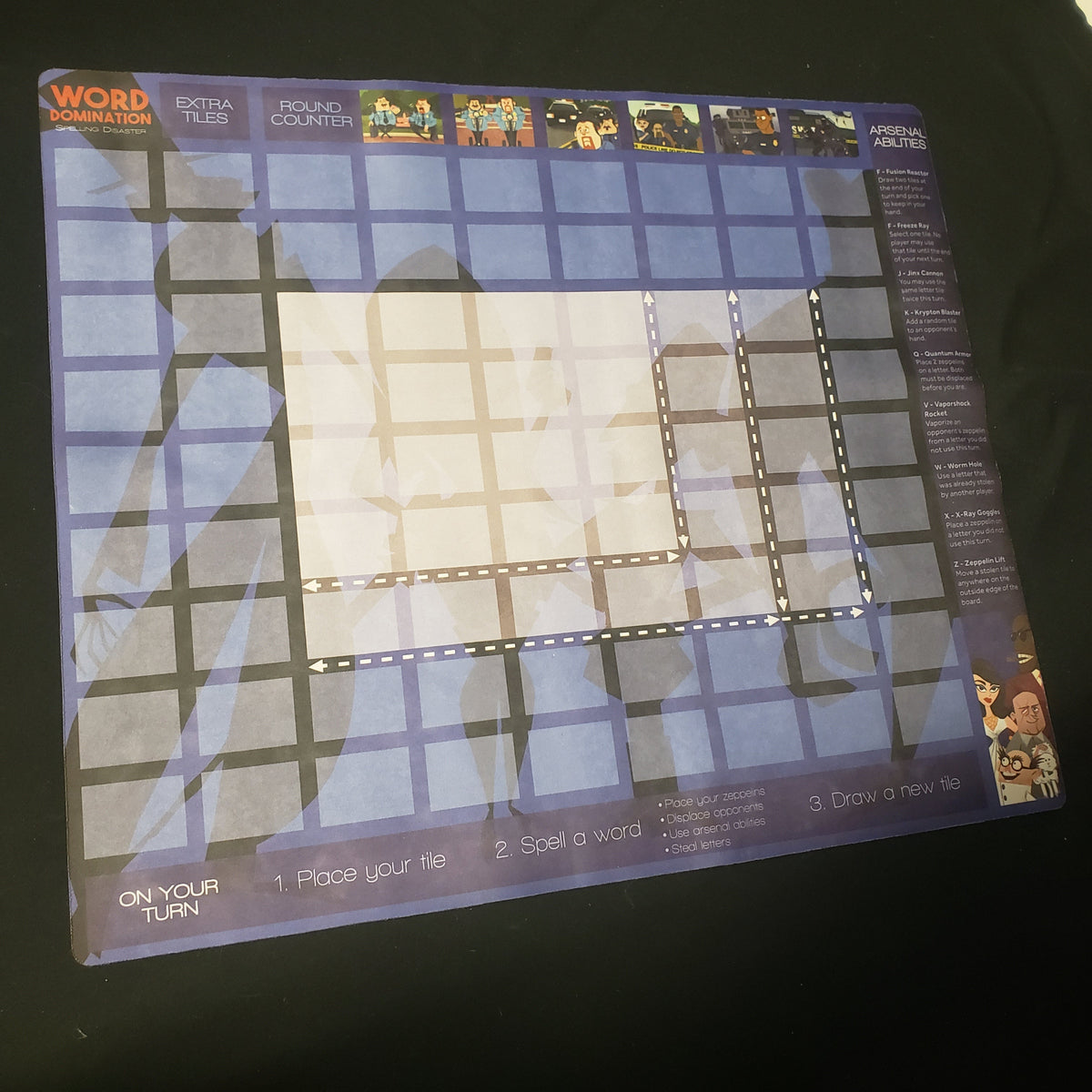 Image shows a multiplayer gaming playmat for the card game Word Domination