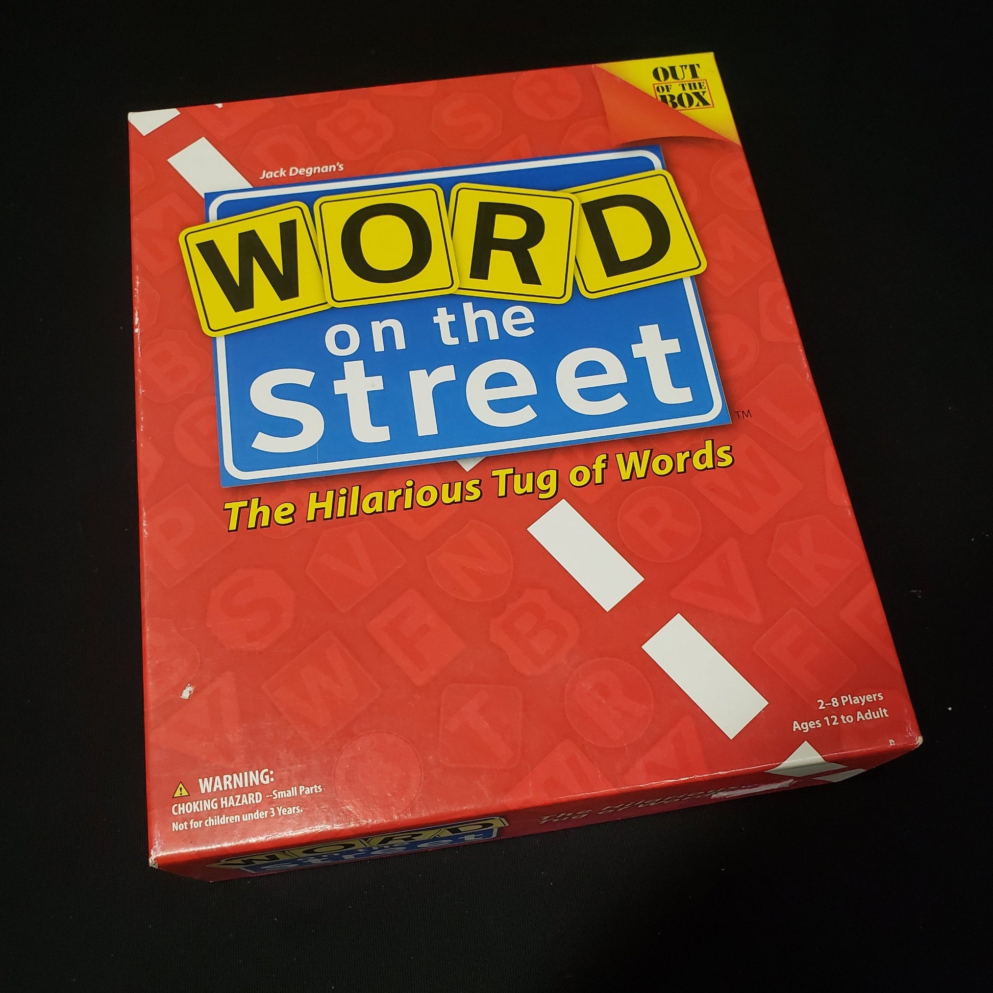 Image shows the front cover of the box of the Word on the Street board game