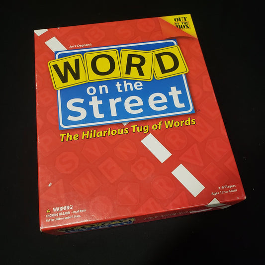 Image shows the front cover of the box of the Word on the Street board game