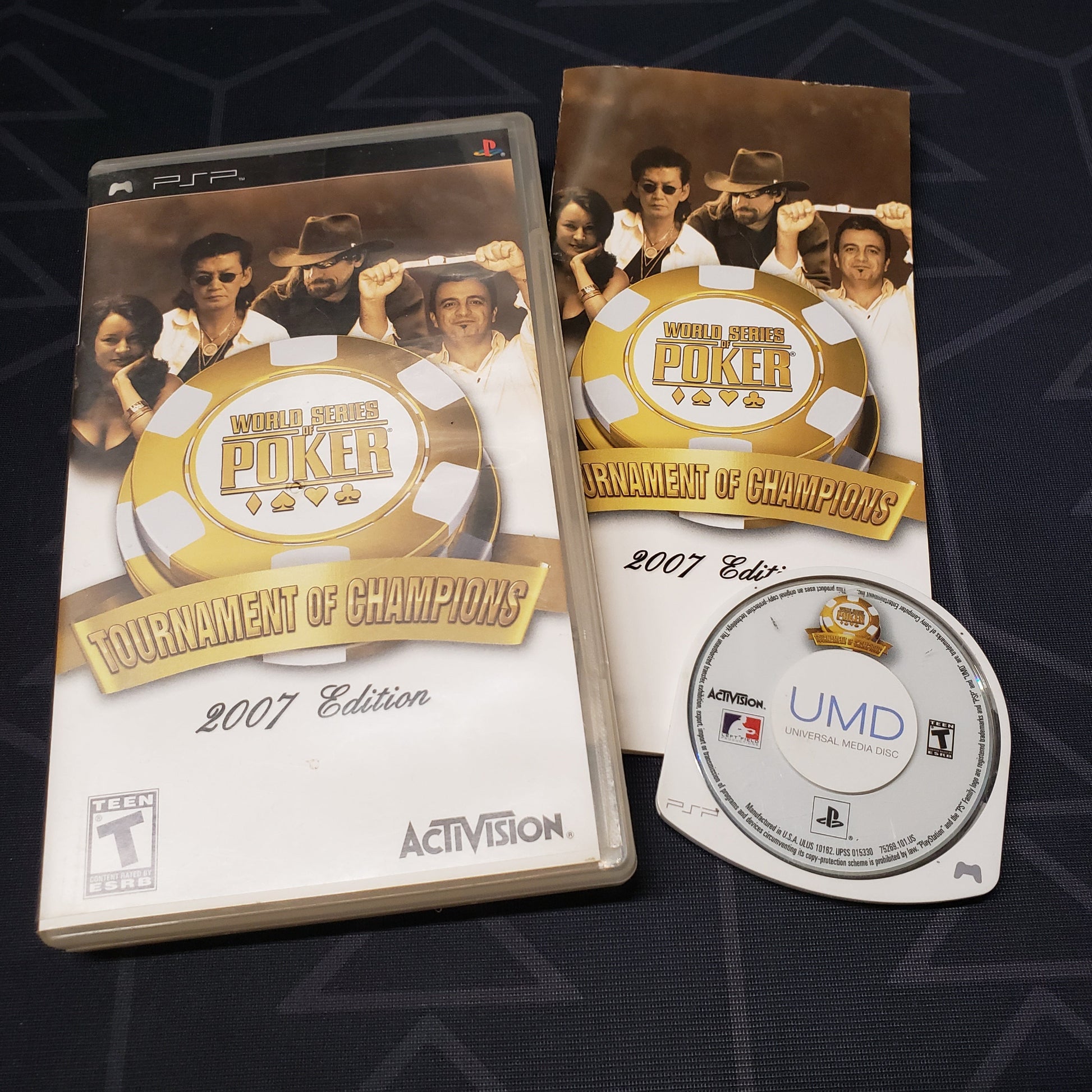 Image shows the case, manual and UMD disc for the video game World Series of Poker: Tournament of Champions 2007 for Playstation Portable