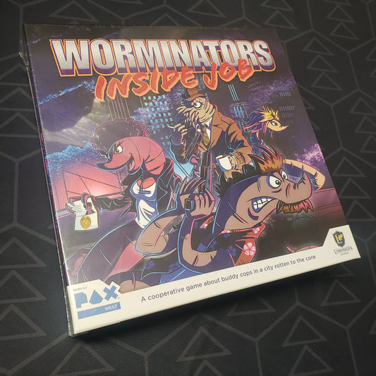 Image shows the front cover of the box for the Worminators: Inside Job board game