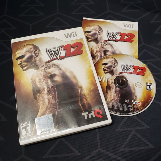 Image shows the case, manual and disc for the video game WWE '12 for Nintendo Wii