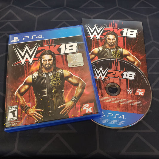 Image shows the case, manual and disc for the video game WWE 2K18 for Playstation 4