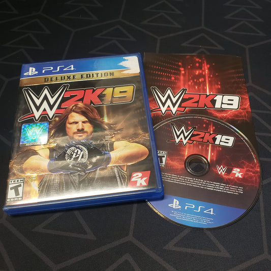 Image shows the case, manual & disc for the video game WWE 2K19 for Playstation 4