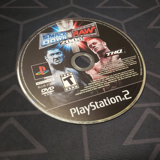 Image shows the label side of the game disc for the video game WWE Smackdown vs. Raw 2006 for Playstation 2