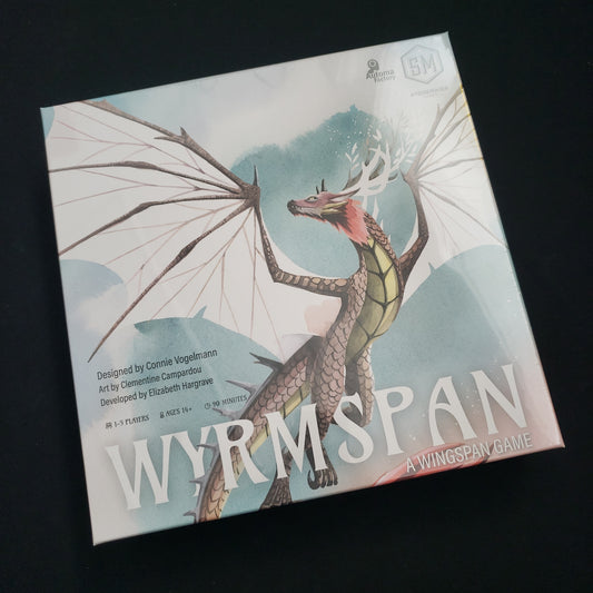 Image shows the front cover of the box of the Wyrmspan board game