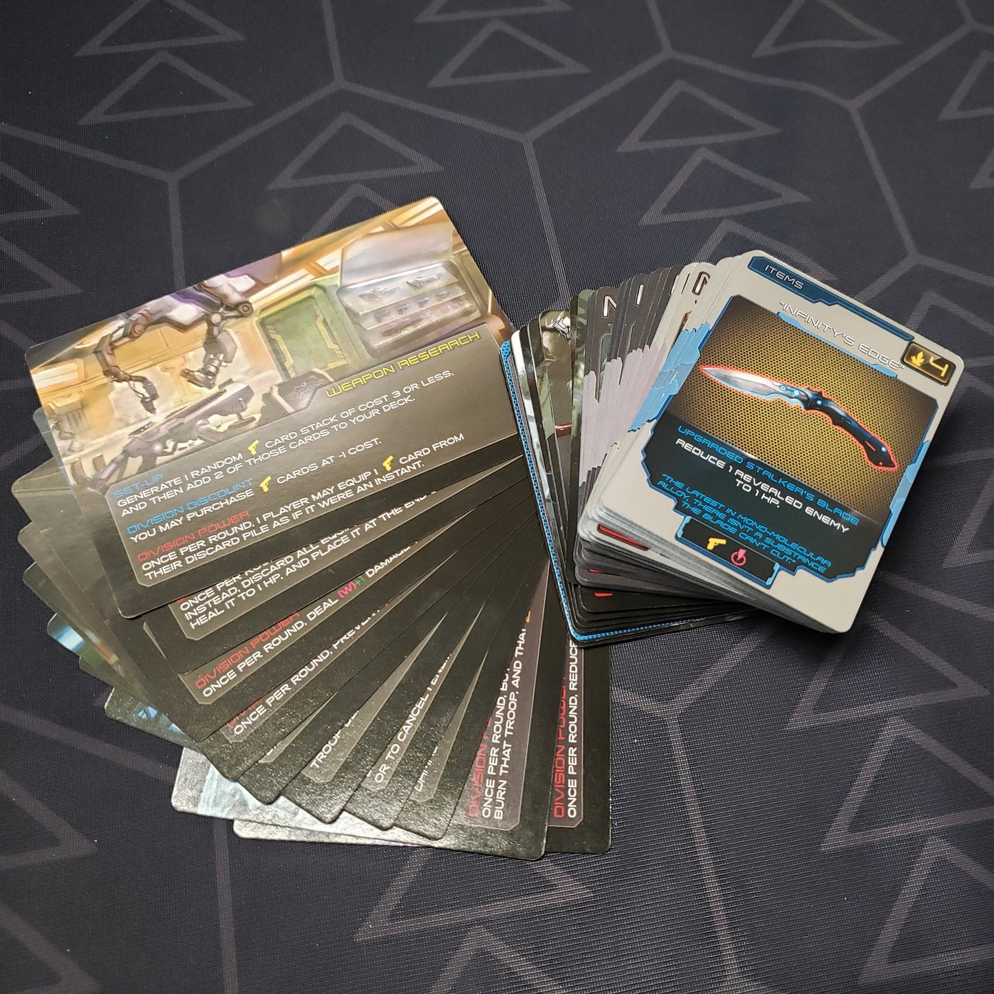 Image shows the fanned-out cards for the Kickstarter Card Pack expansion for the board game XenoShyft: Dreadmire