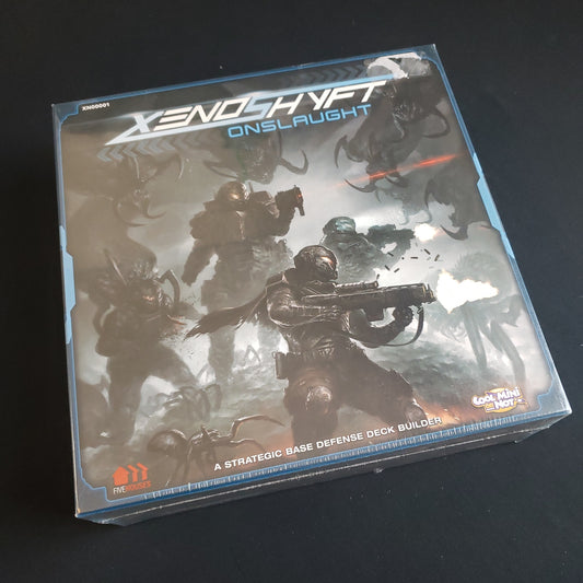 Image shows the front cover of the box of the Xnoshyft: Onslaught board game