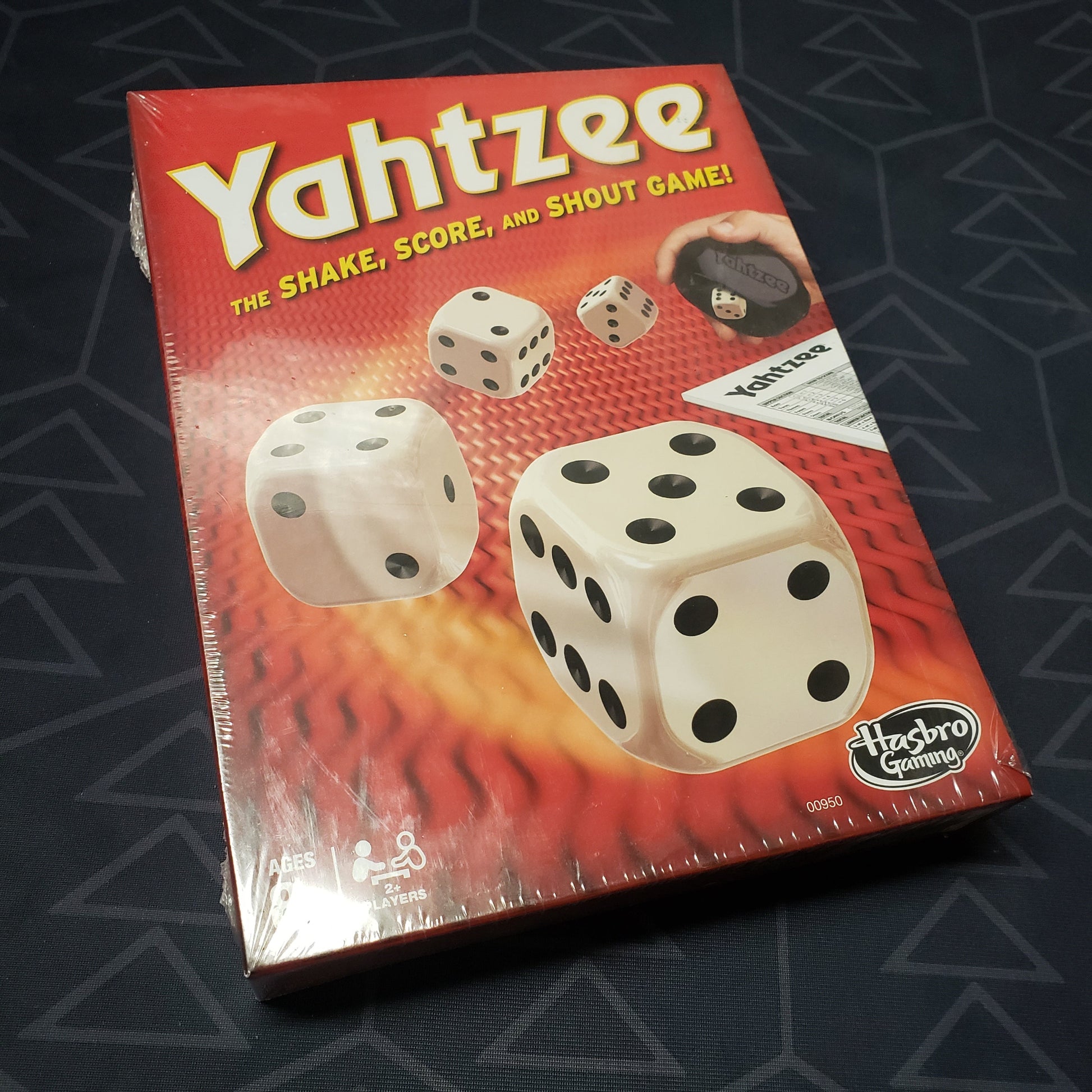 Image shows the front cover of the box for the Yahtzee board game