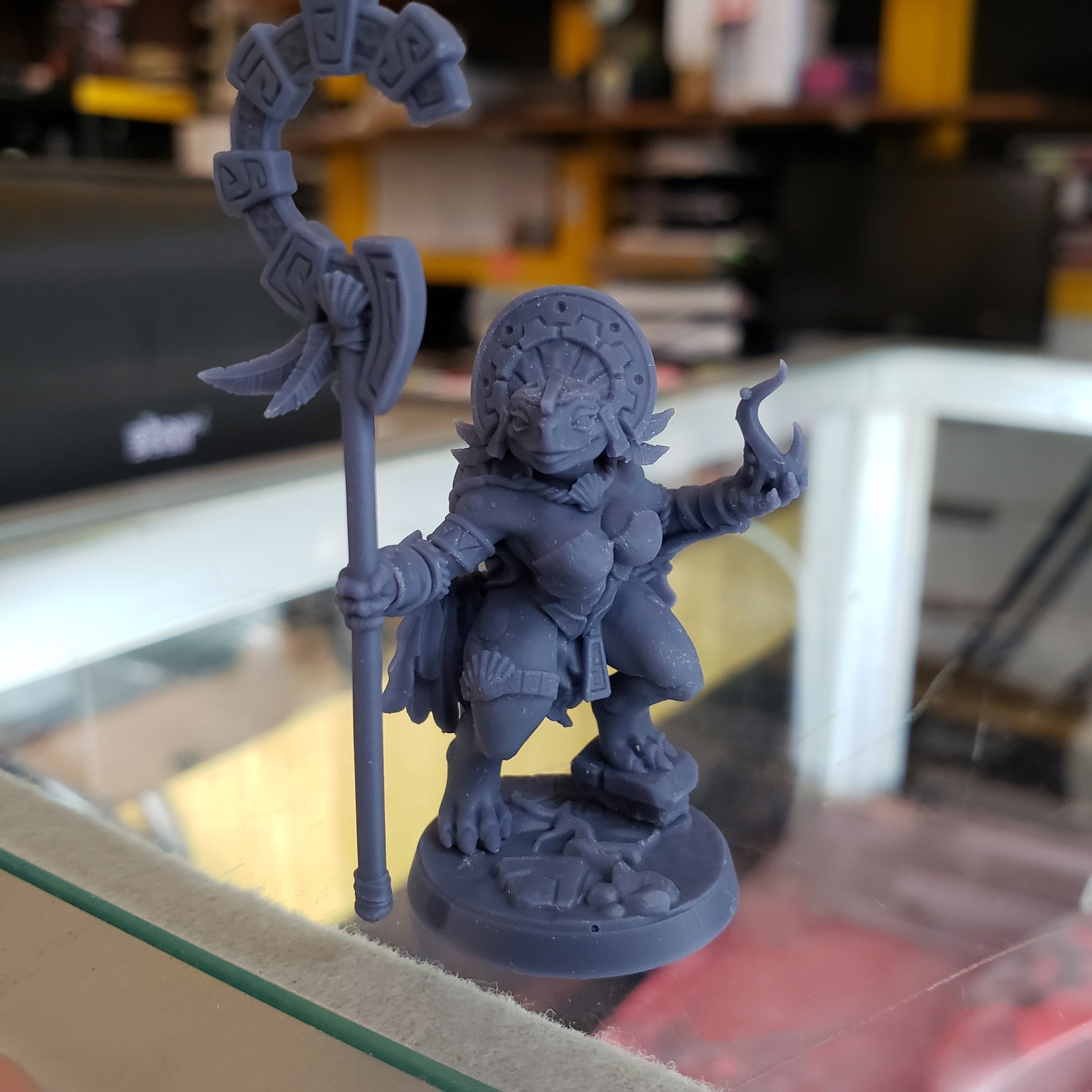 Image shows an example of a 3D printed turtle cleric gaming miniature printed in-house at All Systems Go