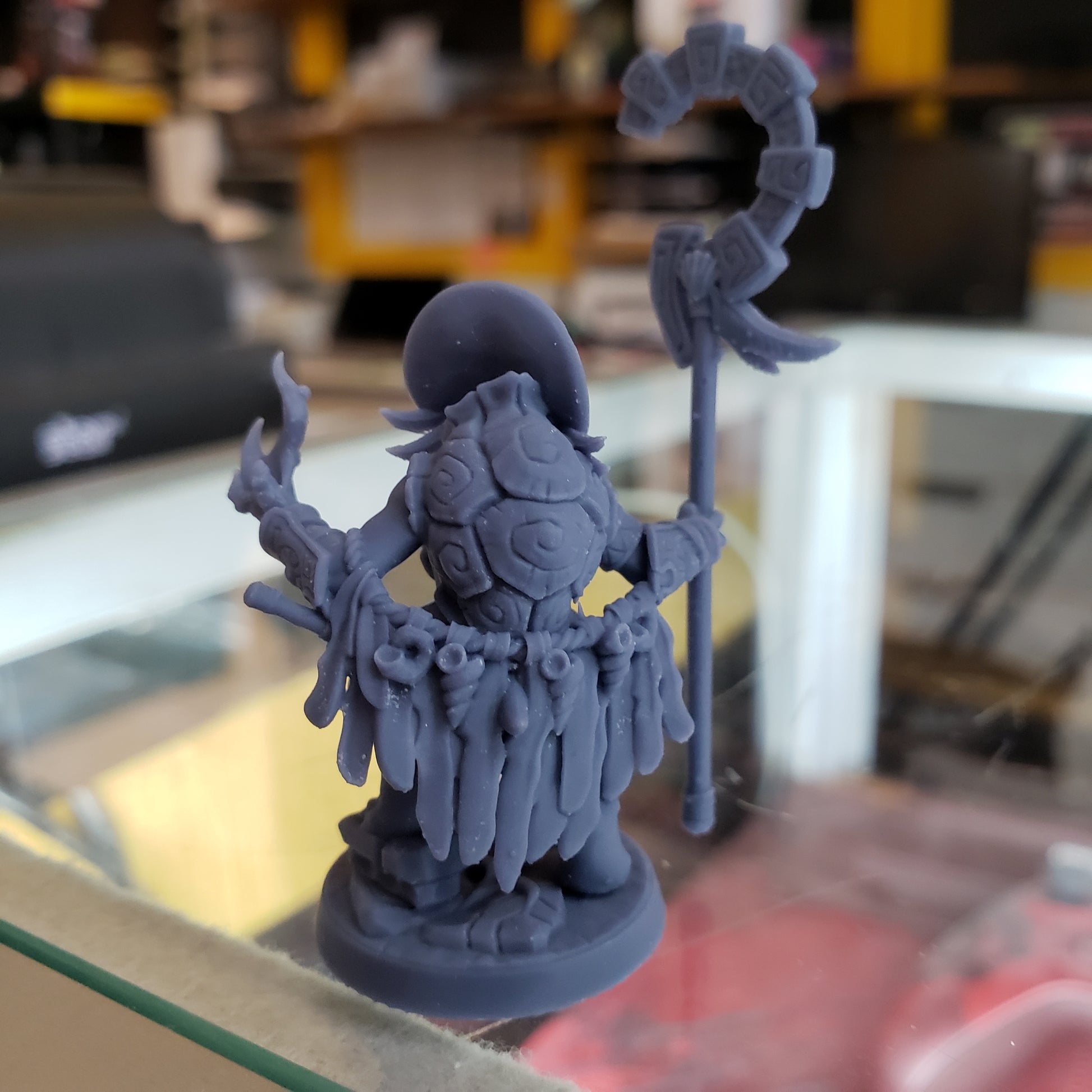 Image shows an example of a 3D printed turtle cleric gaming miniature printed in-house at All Systems Go