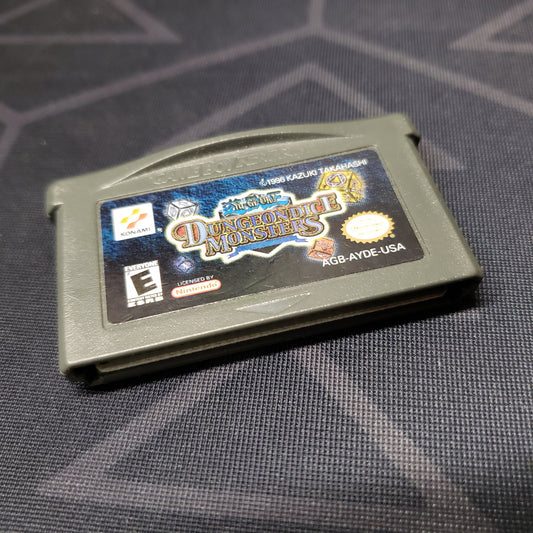 Image shows the front of the cartridge for the video game Yu-Gi-Oh!: Dungeondice Monsters for Nintendo Game Boy Advance