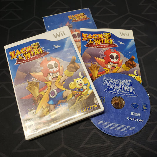 Image shows the case, manual, lenticular puzzle and disc for the video game Zack & Wiki: Quest for Barbaros' Treasure for Nintendo Wii