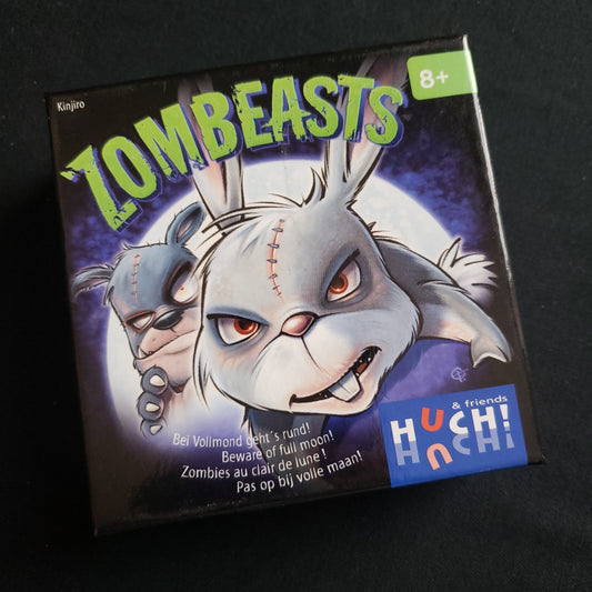 Image shows the front cover of the box of the Zombeasts card game