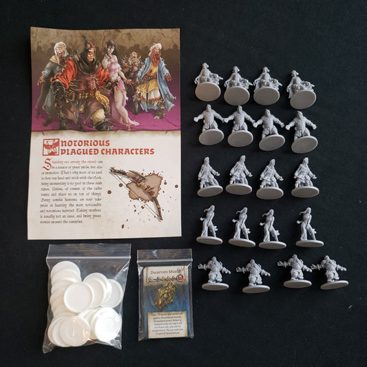Image shows the instructions, miniatures and cards for the Notorious Plagued Characters NPC-1 expansion for the board game Zombicide: Black Plague