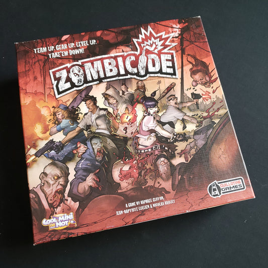 Image shows the front cover of the box of the Zombicide board game