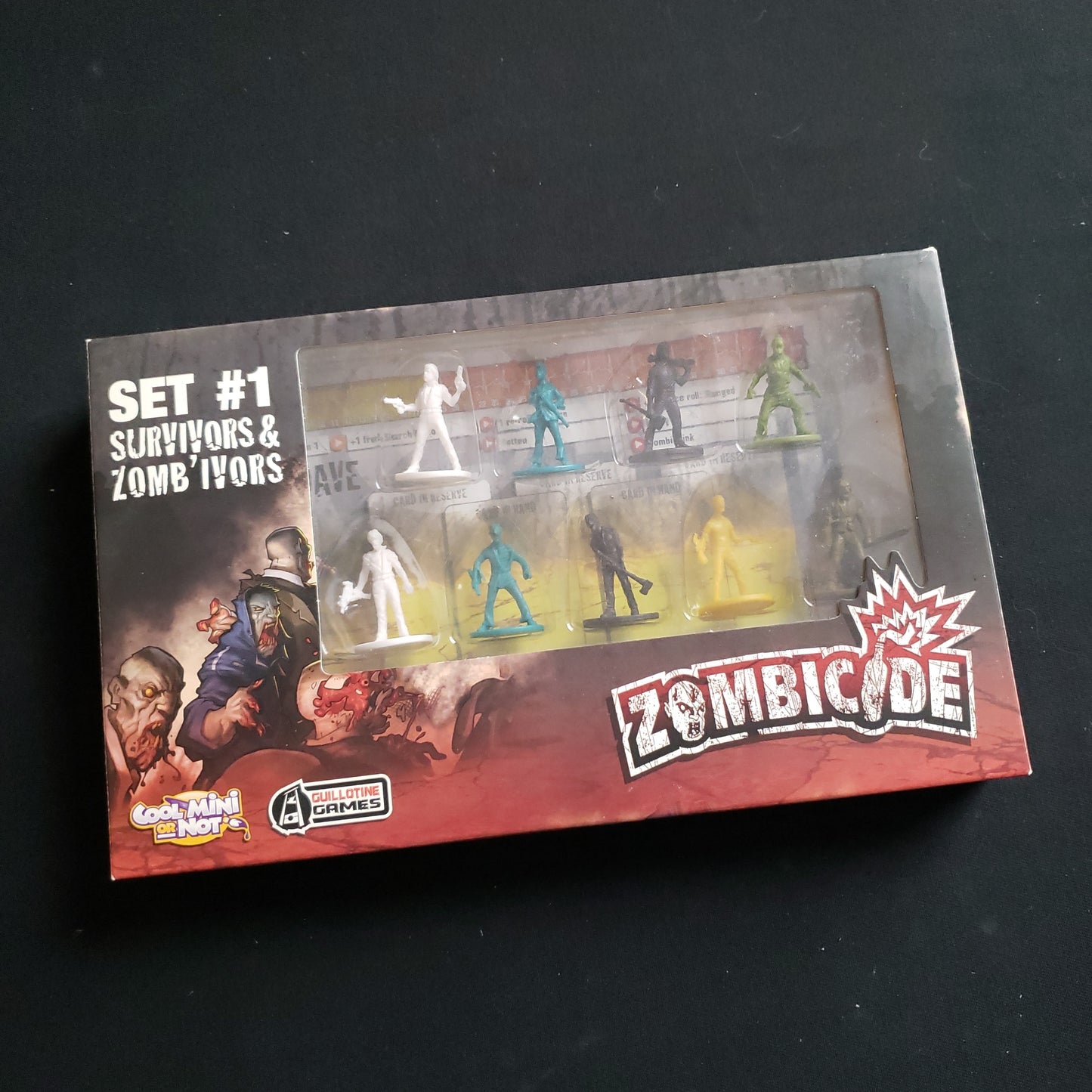 Image shows the front cover of the box of the Set 1 Survivors miniature pack for the Zombicide board game
