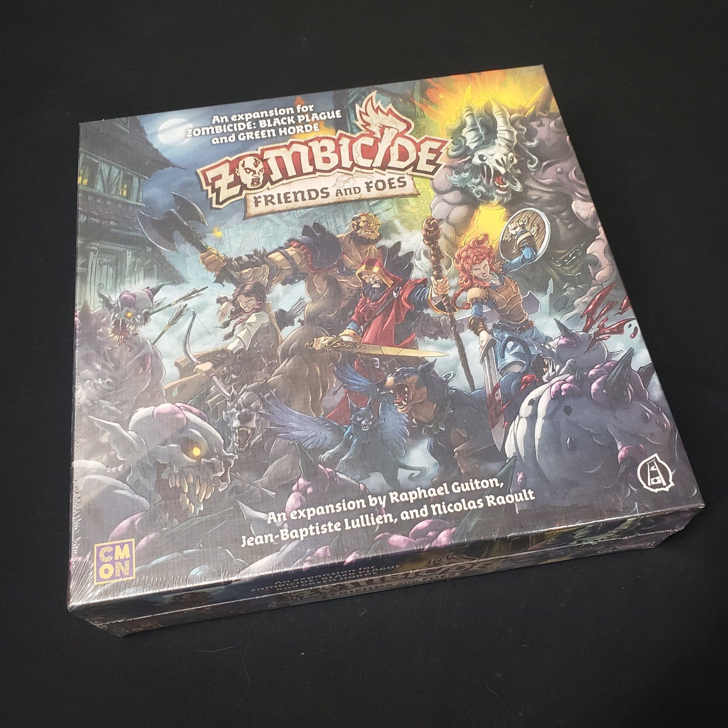 Image shows the front of the box for the Friends and Foes expansion for the board games Zombicide: Black Plague & Green Horde