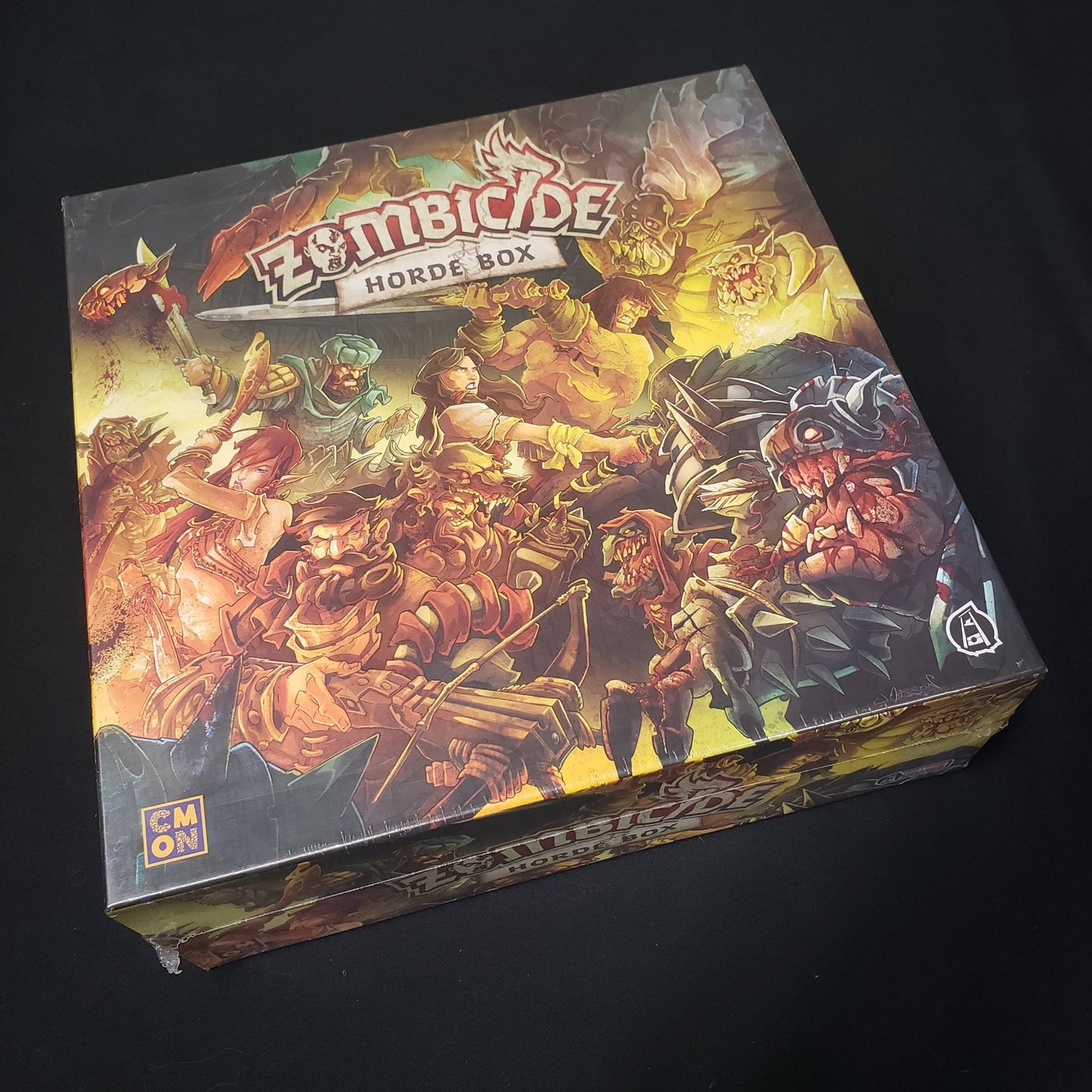 Image shows the front of the box for the Horde Box Stretch Goals expansion for the board game Zombicide: Green Horde
