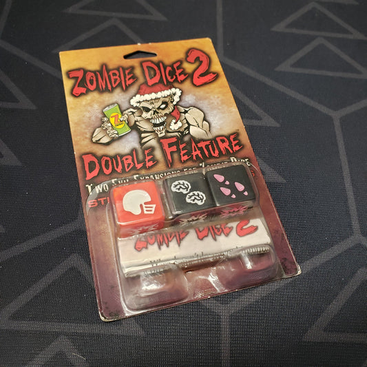 Image shows the front cover of the package of the Double Feature expansion for the dice game Zombie Dice