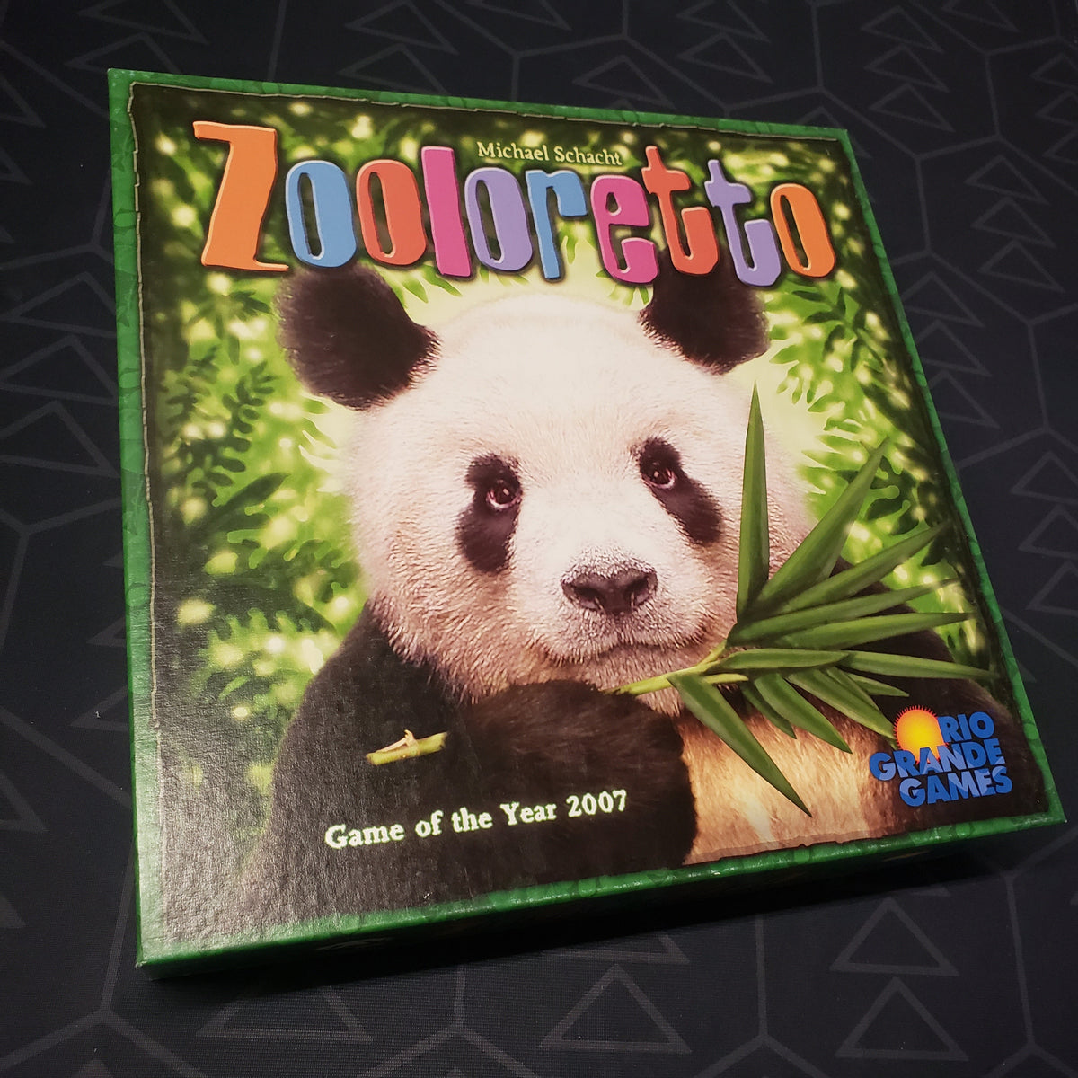 Image shows the front cover of the box for the Zooloretto board game