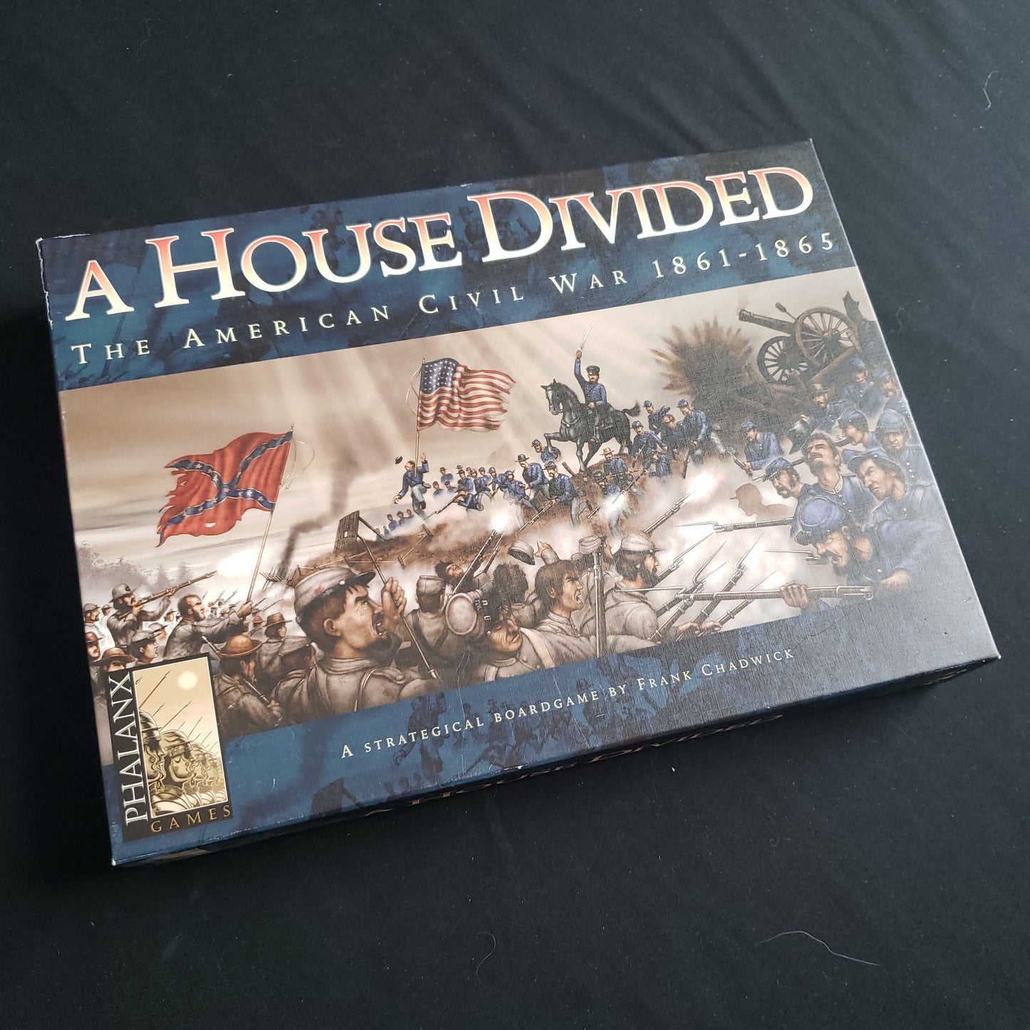 Image shows the front cover of the box of the A House Divided board game