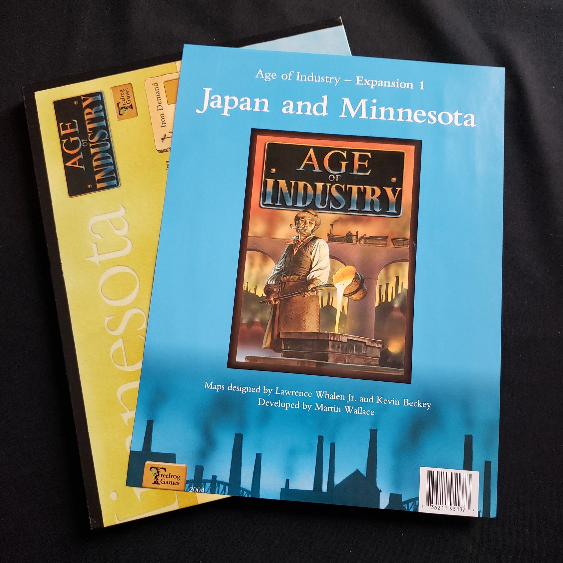 Image shows the board and instructions for the Japan & Minnesota expansion for the Age of Industry board game