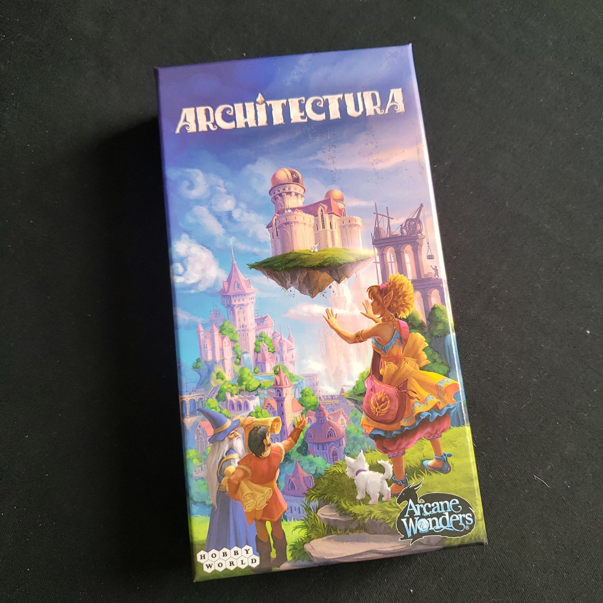 Image shows the front cover of the box of the Architectura card game