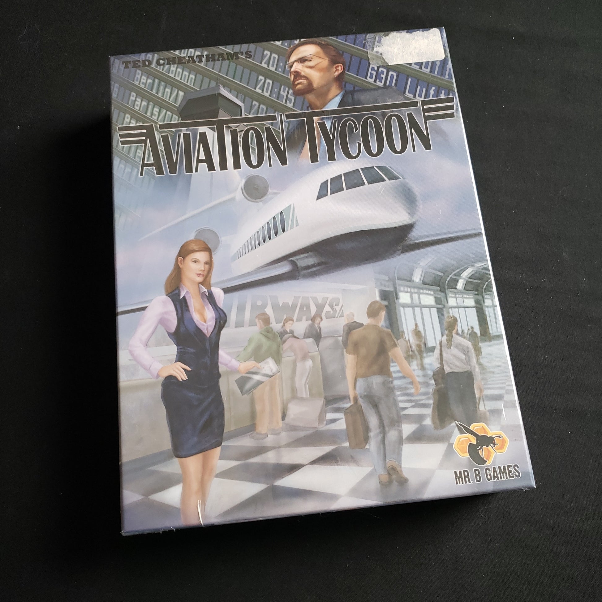 Image shows the front cover of the box of the Aviation Tycoon board game