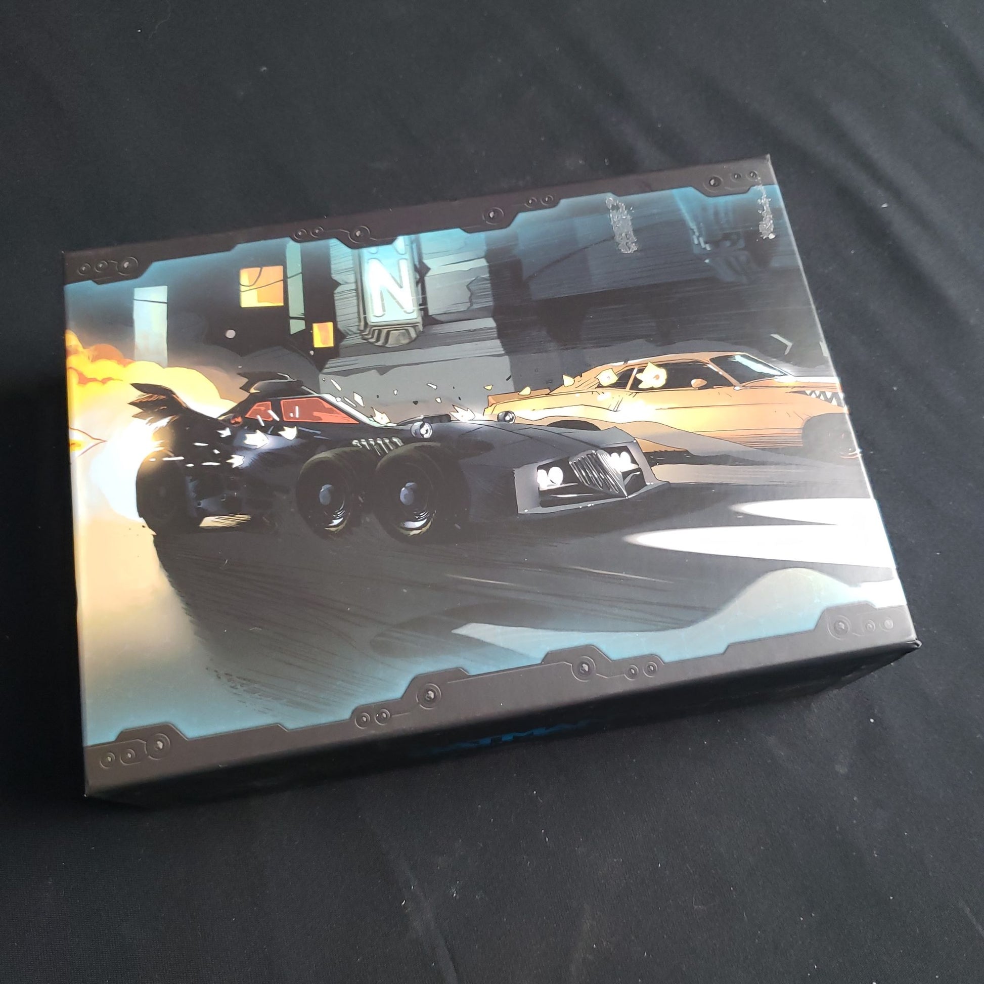 Image shows the front cover of the box of the Batmobile expansion for the Btman: Gotham City Chronicles board game