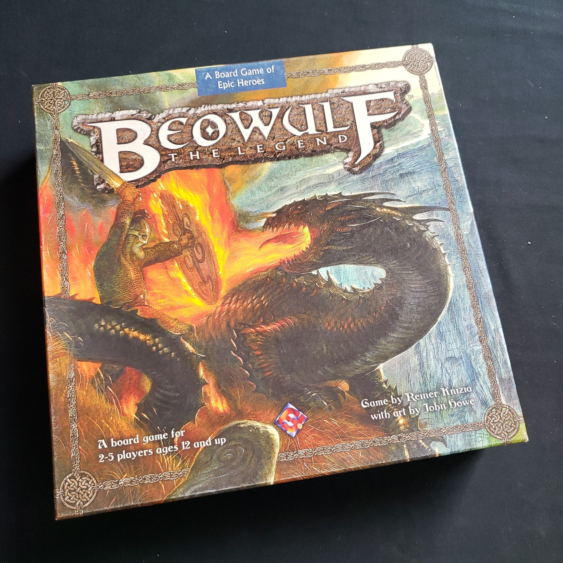 Image shows the front cover of the box of the Beowulf: The Legend board game