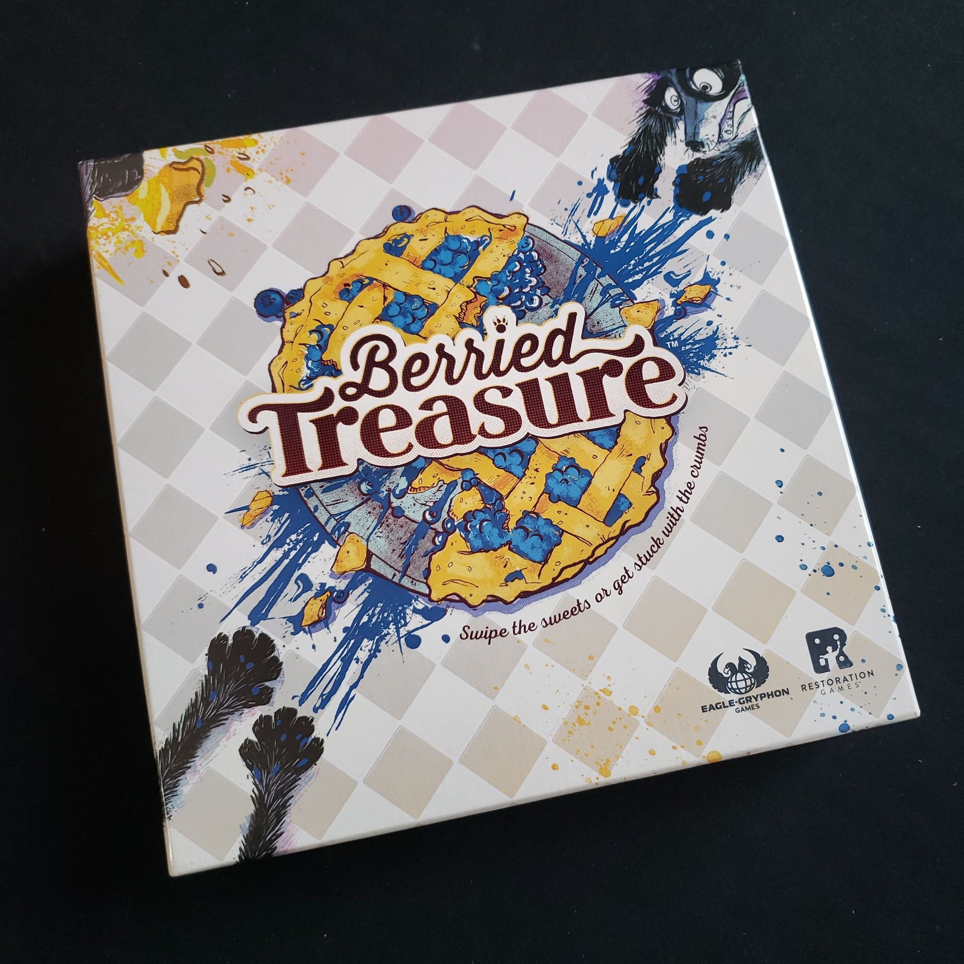 Image shows the front cover of the box of the Berried Treasure card game
