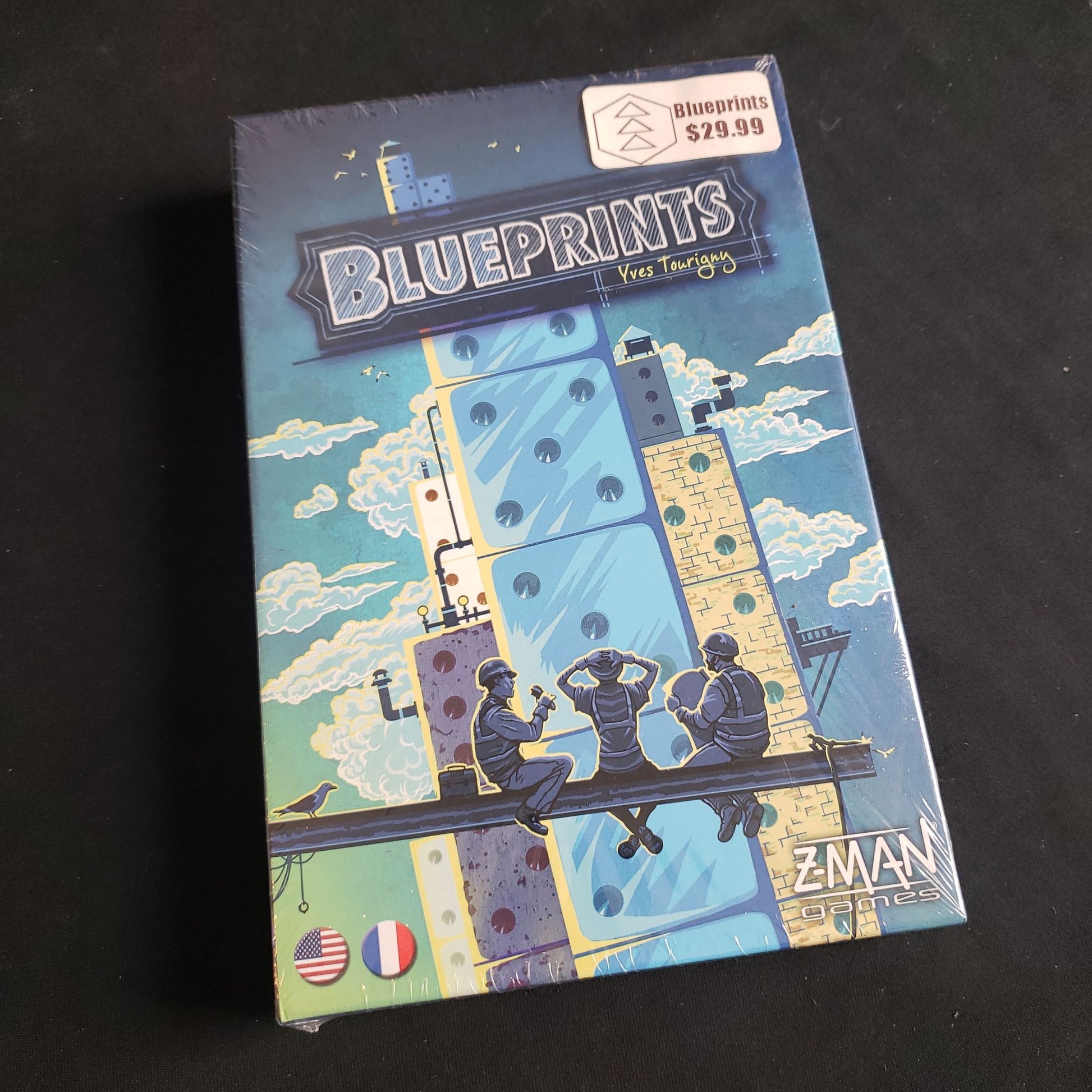 Image shows the front cover of the box of the Blueprints board game