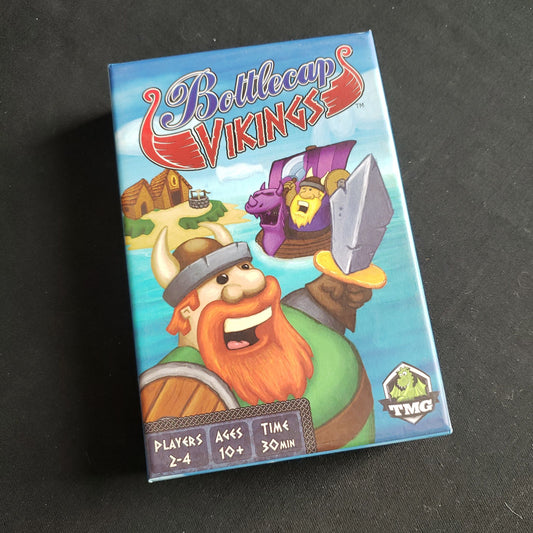 Image shows the front cover of the box of the Bottlecap Vikings board game