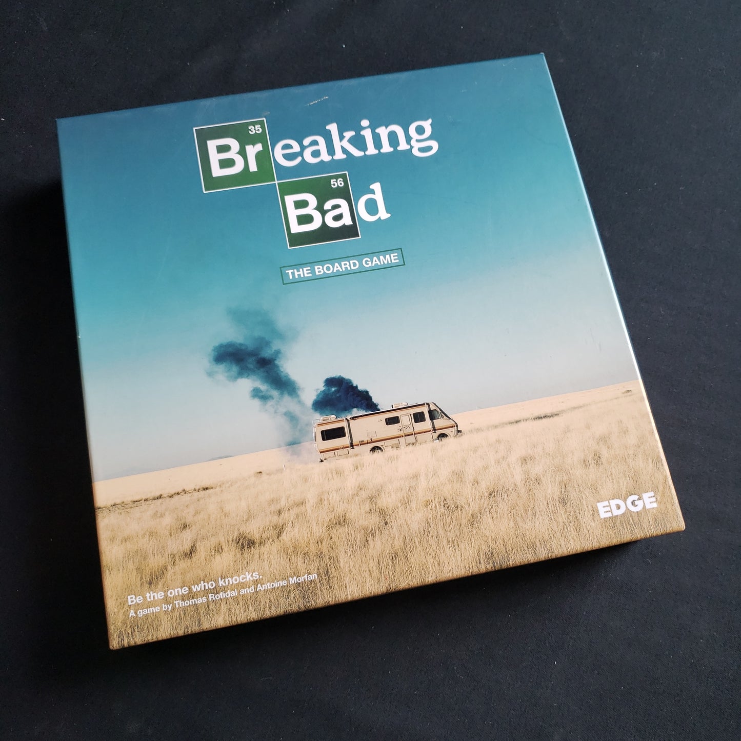 Image shows the front cover of the box of the Breaking Bad board game